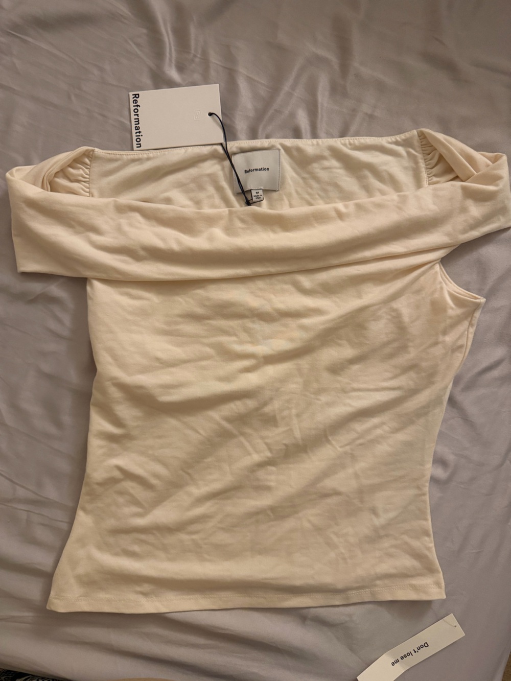 Reformation Cello off-shoulder knit cream top